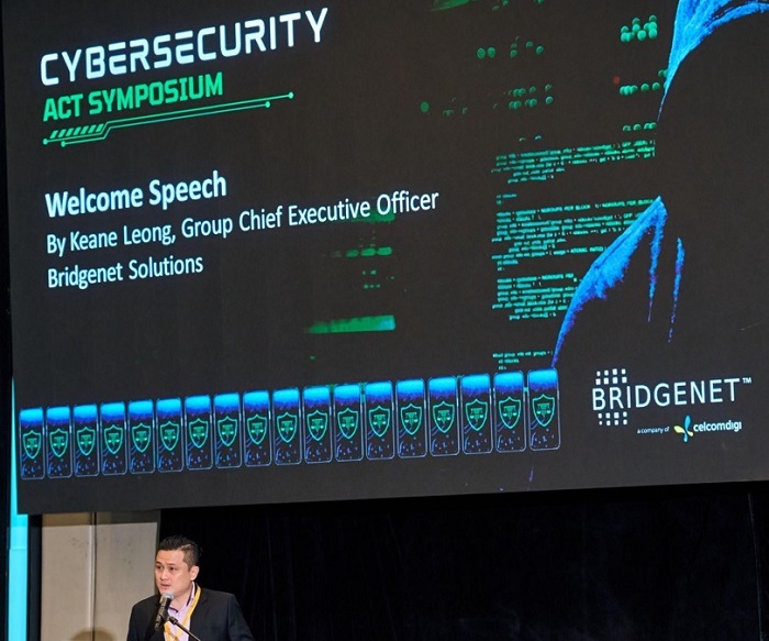 Keane Leong, Group CEO of Bridgenet Solutions presents his welcome speech at the inaugural Cybersecurity Act Symposium.