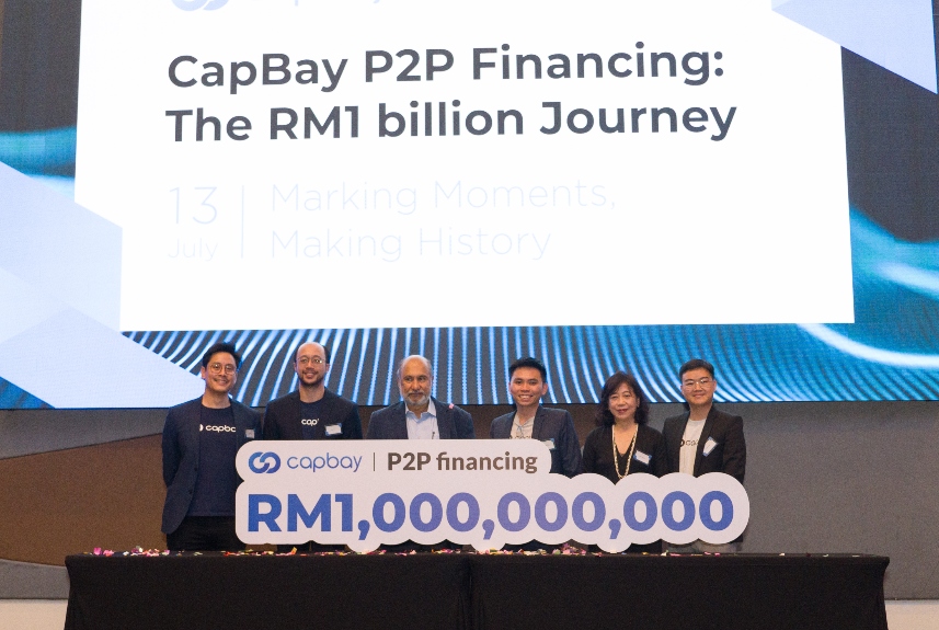 Left to Right: CapBay directors Darrel Ang, Dion Tan, Mohd Mokhtar Mohd Shariff (Chairman), Ang Xing Xian (CEO), Jasmine Lau, and Edwin Tan celebrate RM1 billion financing journey