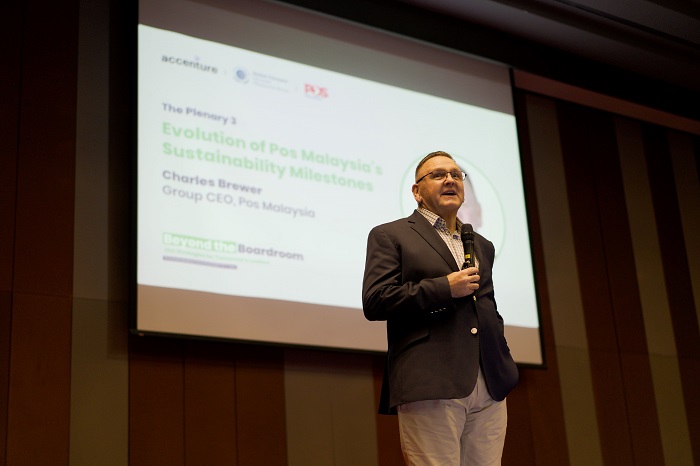 Charles Brewer at a recent event hosted by Accenture Malaysia talking about Pos Malaysia's sustainability journey, which, while still early in, will see the company deliver 315,000 clean kilometres of last-mile delivery by end 2023. of 