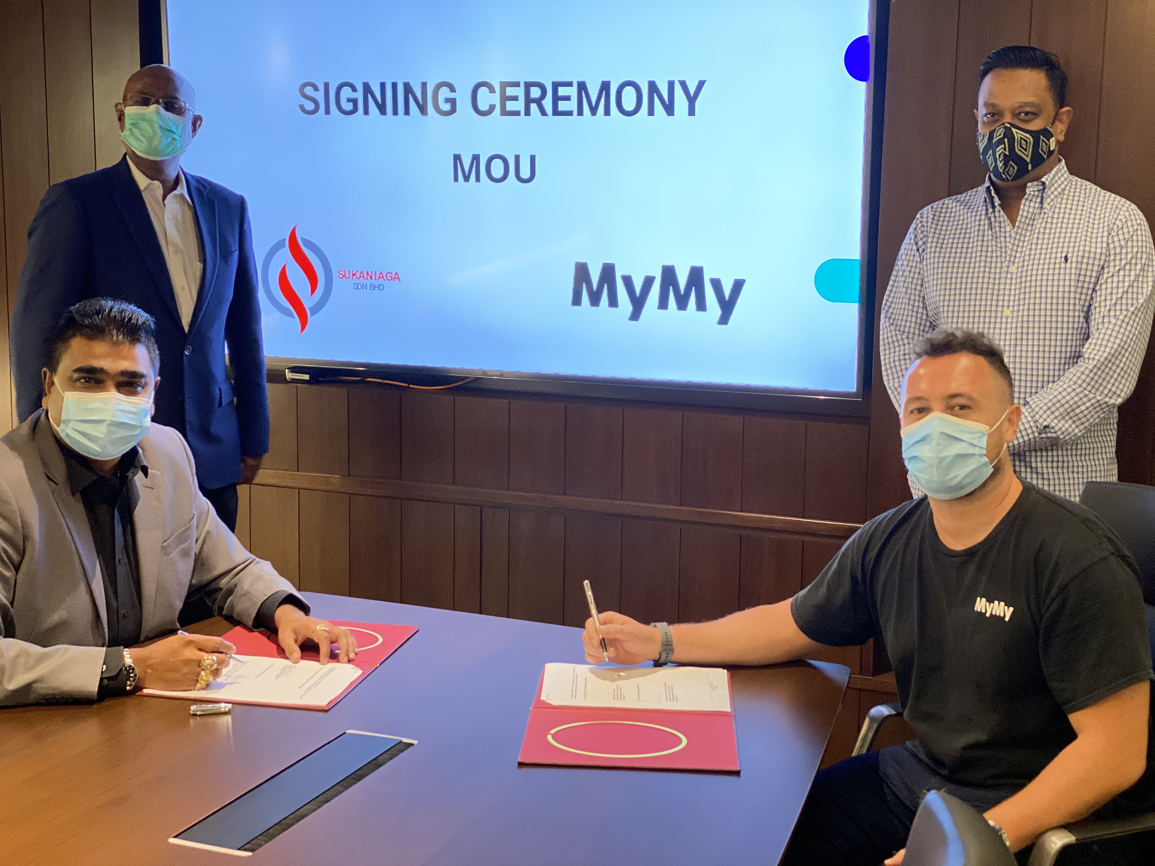 From l to r: Vallo Mutto, Sukaniaga director; Mohammad Shaharul, Sukaniaga managing director; Kishore Samuel, MyMy co-founder and COO; Joe McGuire, MyMy co-founder and CEO at the signing ceremony