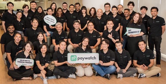 The Paywatch team with founders, Richard Kim (seated, 2nd from right) and his brother, Alex Kim (3rd from right).