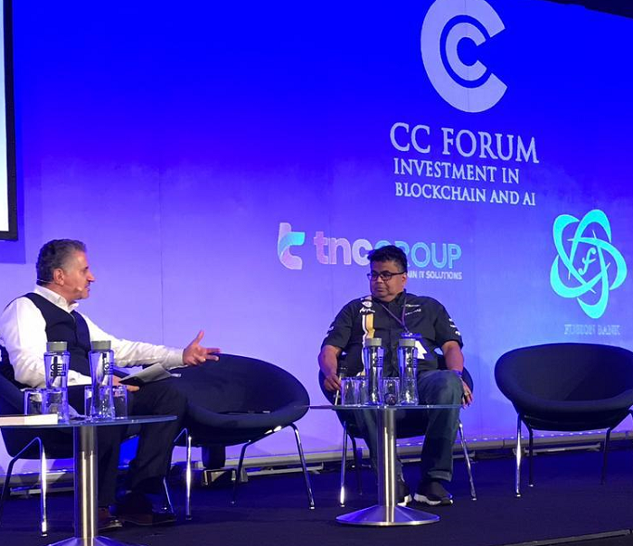 Rais Hussin (right) speaking at a Bloakchain & AI conference in London late last year.