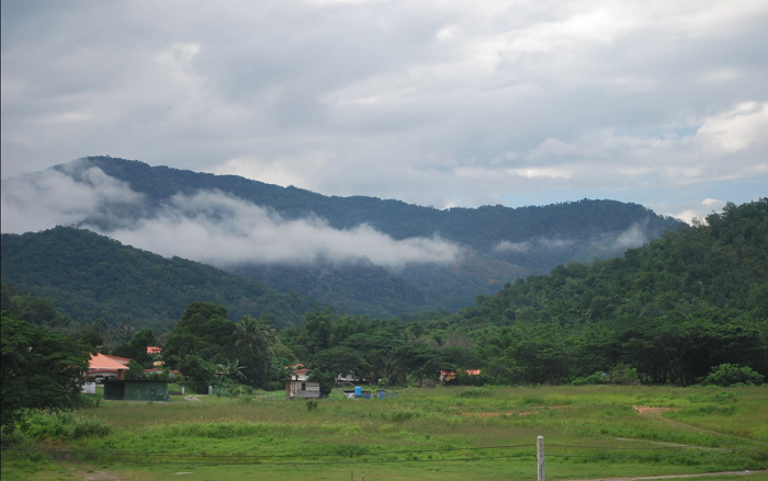 Homes nestled against the hills in Tamparuli, a small town in Sabah. MyTV will rely on DTH satellite to provide its digital TV service to such remote places in Malaysia and meet its ASO commitment by end March 2019.