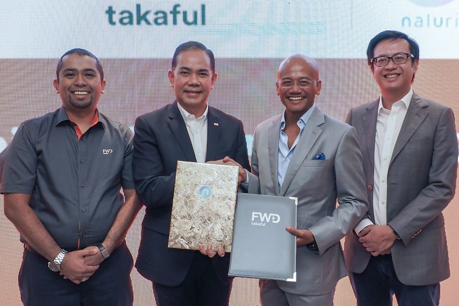(From left) FWD Takaful strategy & digital distribution chief Wan Ahmad Najib; FWD Takaful CEO Salim Majid Zain; Naluri Hidup co-founder & CEO Azran Osman-Rani; and Naluri co-founder & president Dr Jeremy Ting