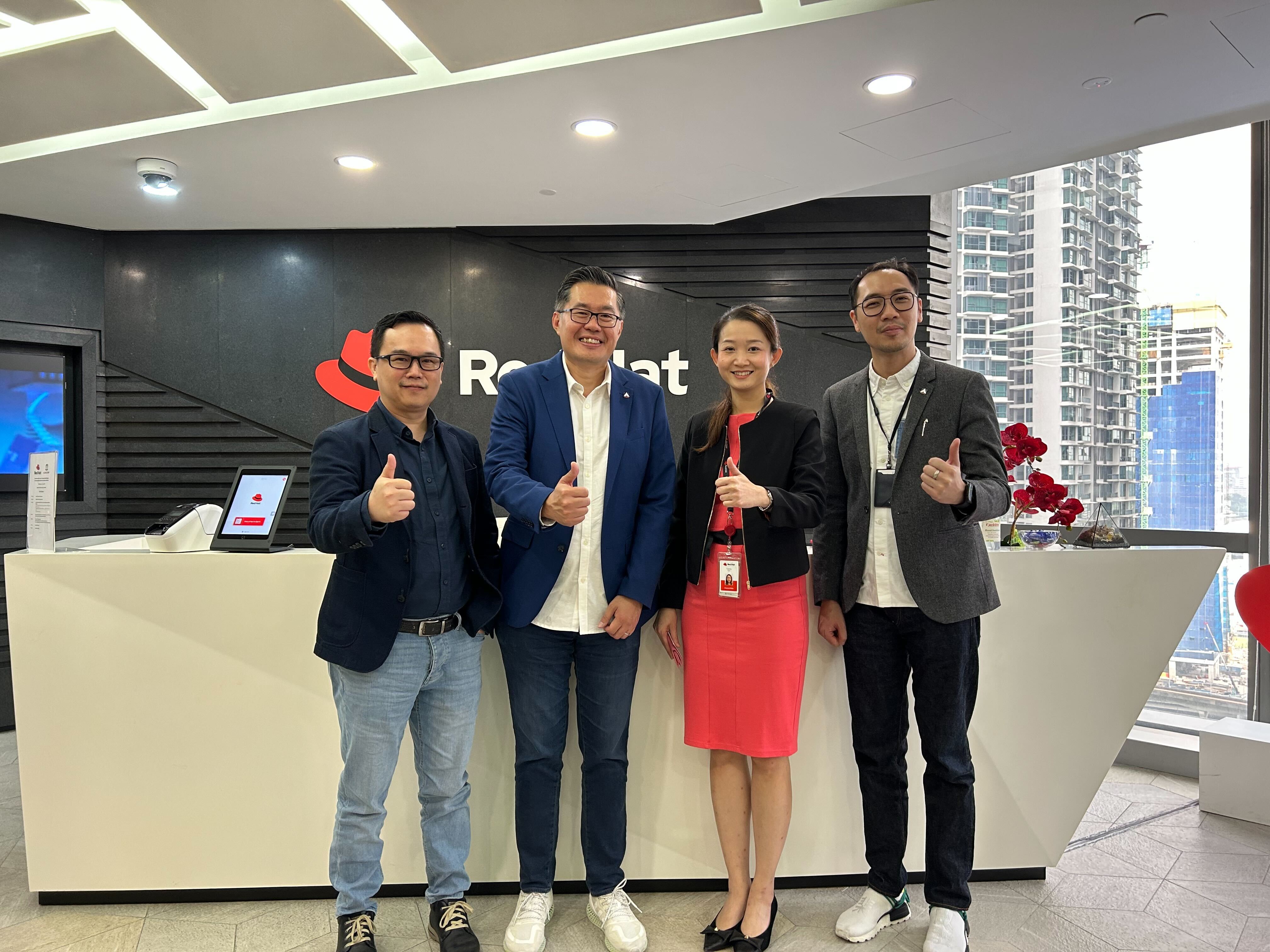 (Left to right) Alliance Bank's leaders Ken Yong (Head, Group Digital Transformation Office) and Edwin Lee (Head, Cards and Loans), Tammy Tan from Red Hat, and David Lim (VP & Head, Credit Card & Personal Loan Products) from Alliance Bank celebrating their successful collaboration on the Visa Virtual Credit Card project.